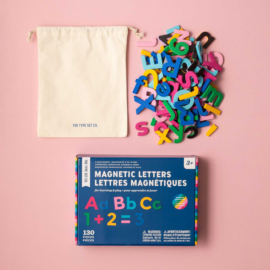 130pc Rainbow Magnetic Letter Set with Canvas Storage Bag on pink background
