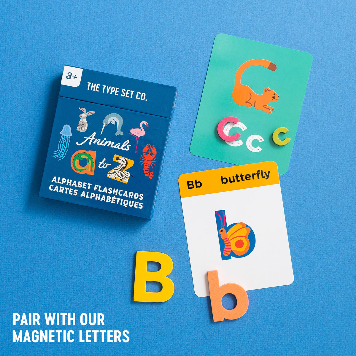 Animals Alphabet Flashcards with packaging paired with large and small magnetic letters that match on blue background
